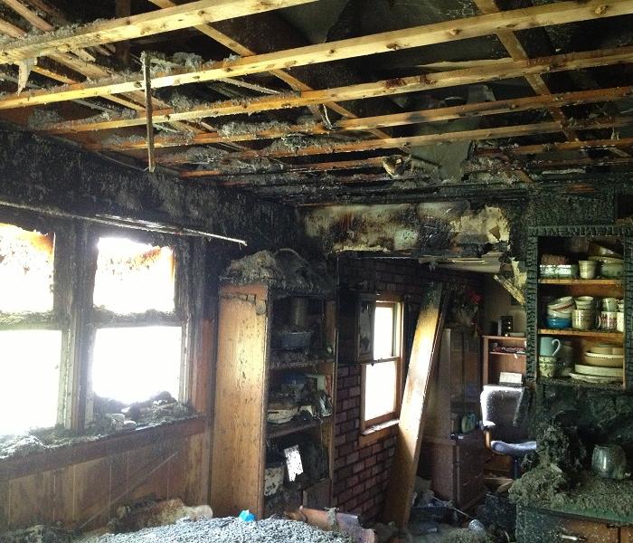 extensive fire damage to a living room in Jackson County 