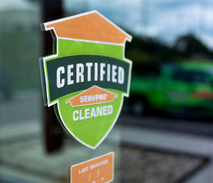 Certified: SERVPRO Cleaned sticker placed on a business door