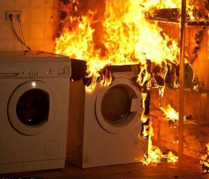 Washer and dryer on fire